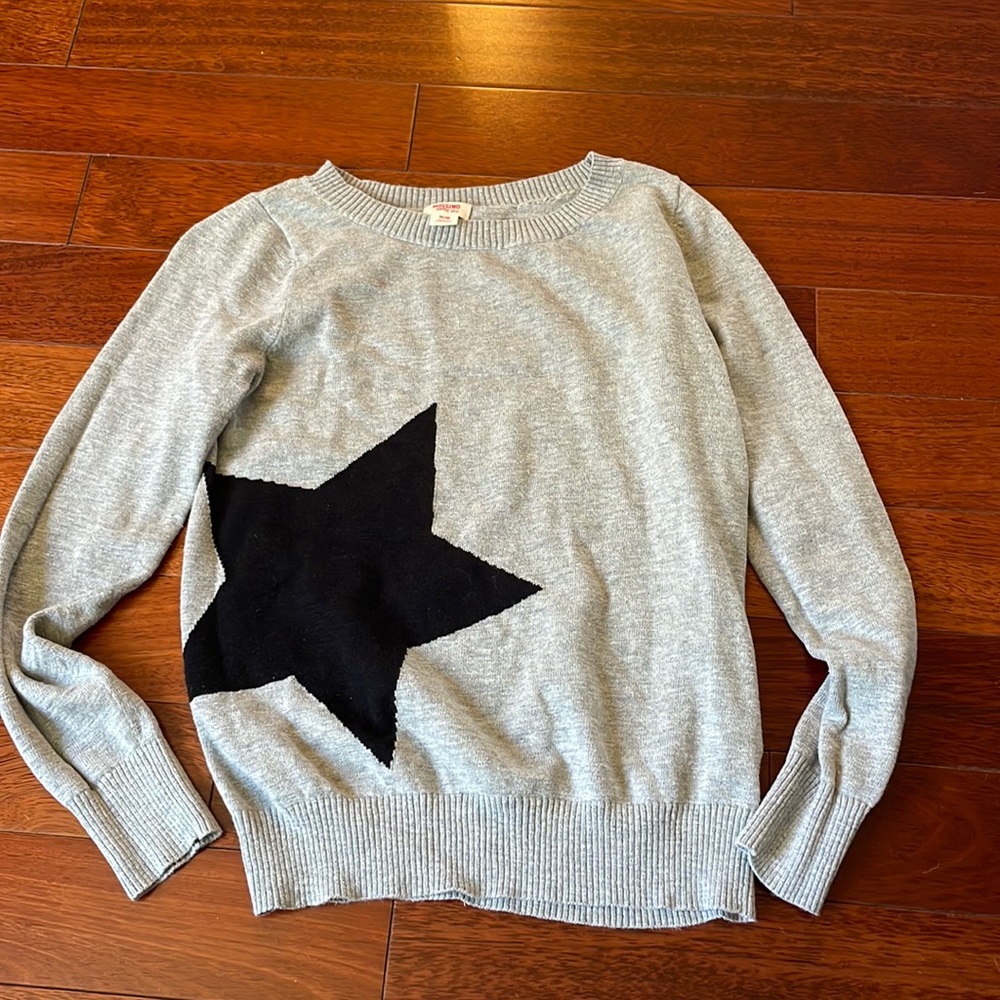 Woman’s star sweater